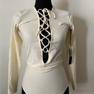 Elegant Cream Lace-Up Bodysuit